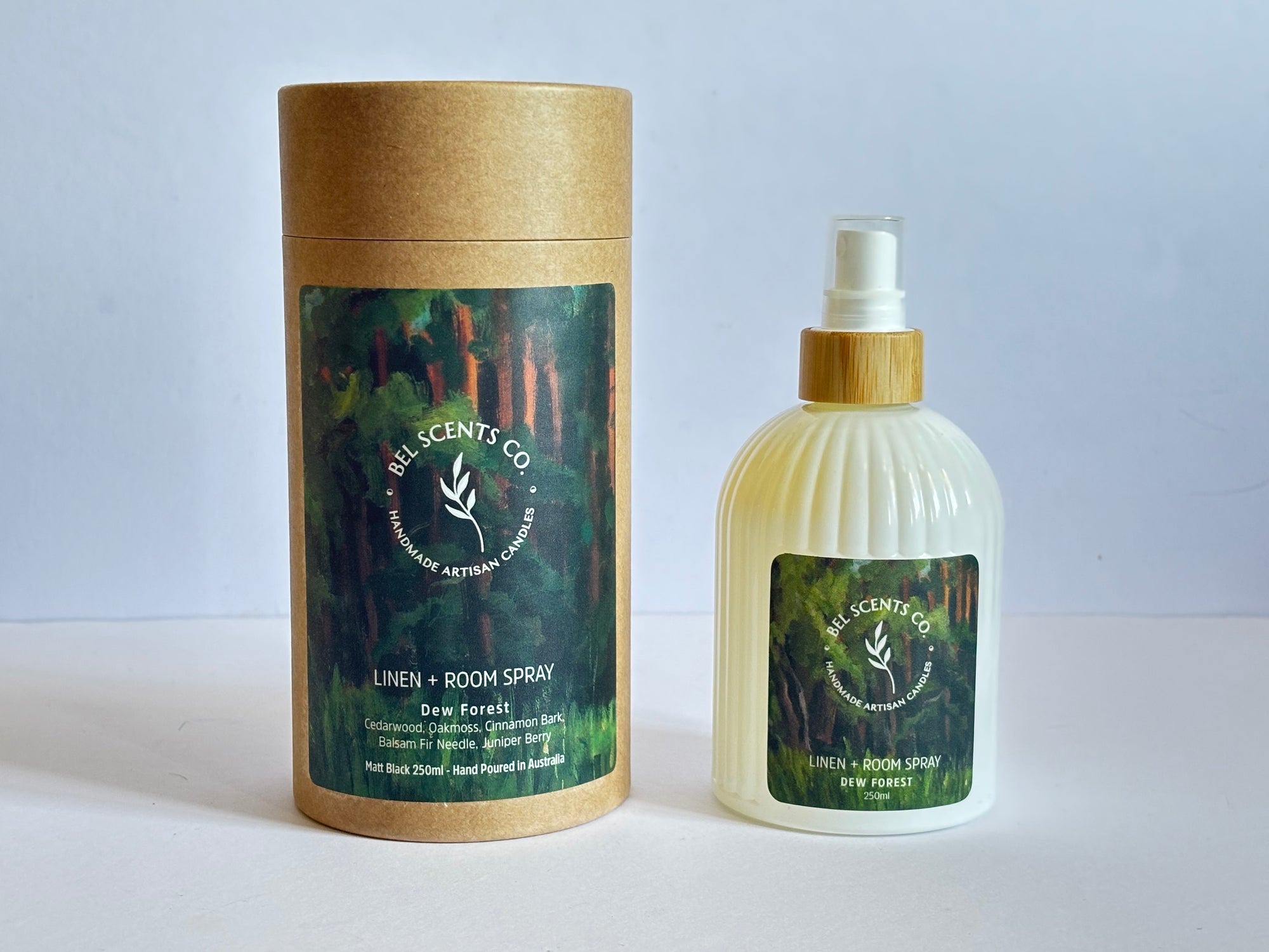 Natural linen and room spray in 250ml bottle, Dew Forest scent with fir needle, cedar wood, and oak moss, hand-poured in Melbourne. Minimalist room spray for home fragrance in recyclable glass packaging.made with botanical ingredients. Our Fabric spray is a great pillow mist with aromatherapy purpose fit sprays. Great Air fresheners for your home fragrance. Made with pure essential oils making it a perfect essential oil spray gift. Make our Dew Forest Scented Spray apart of your home decor.