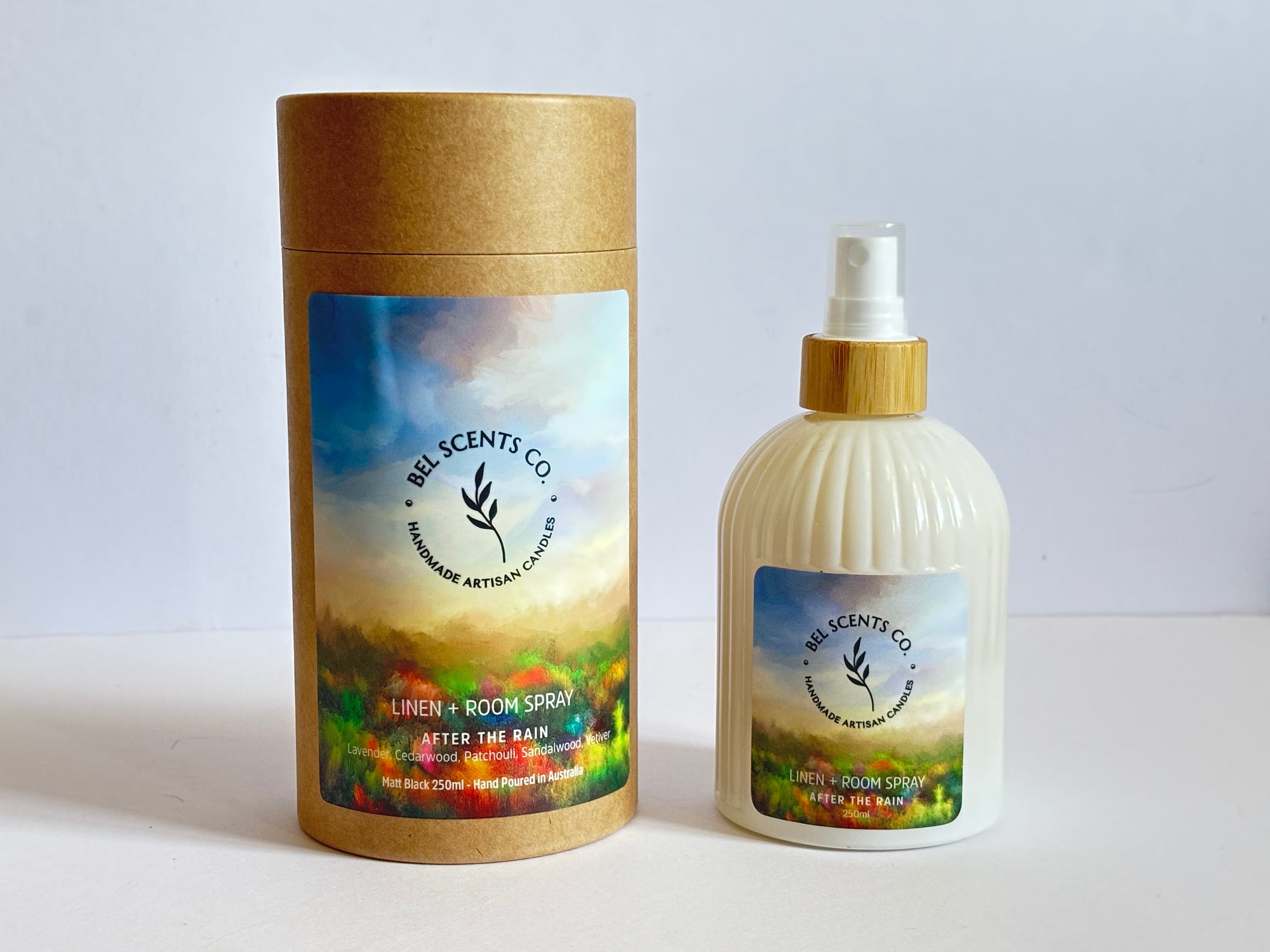 Natural linen and room spray in 250ml bottle, After the Rain Petrichor Essence of  Essential Oil blend. hand-poured in Melbourne. Minimalist room spray for home fragrance in recyclable glass packaging.made with botanical ingredients. Our Fabric spray is a great pillow mist with aromatherapy purpose fit sprays. Great Air fresheners for your home fragrance. Made with pure essential oils making it a perfect essential oil spray gift. Make our After the Rain Scented Spray apart of your home decor.