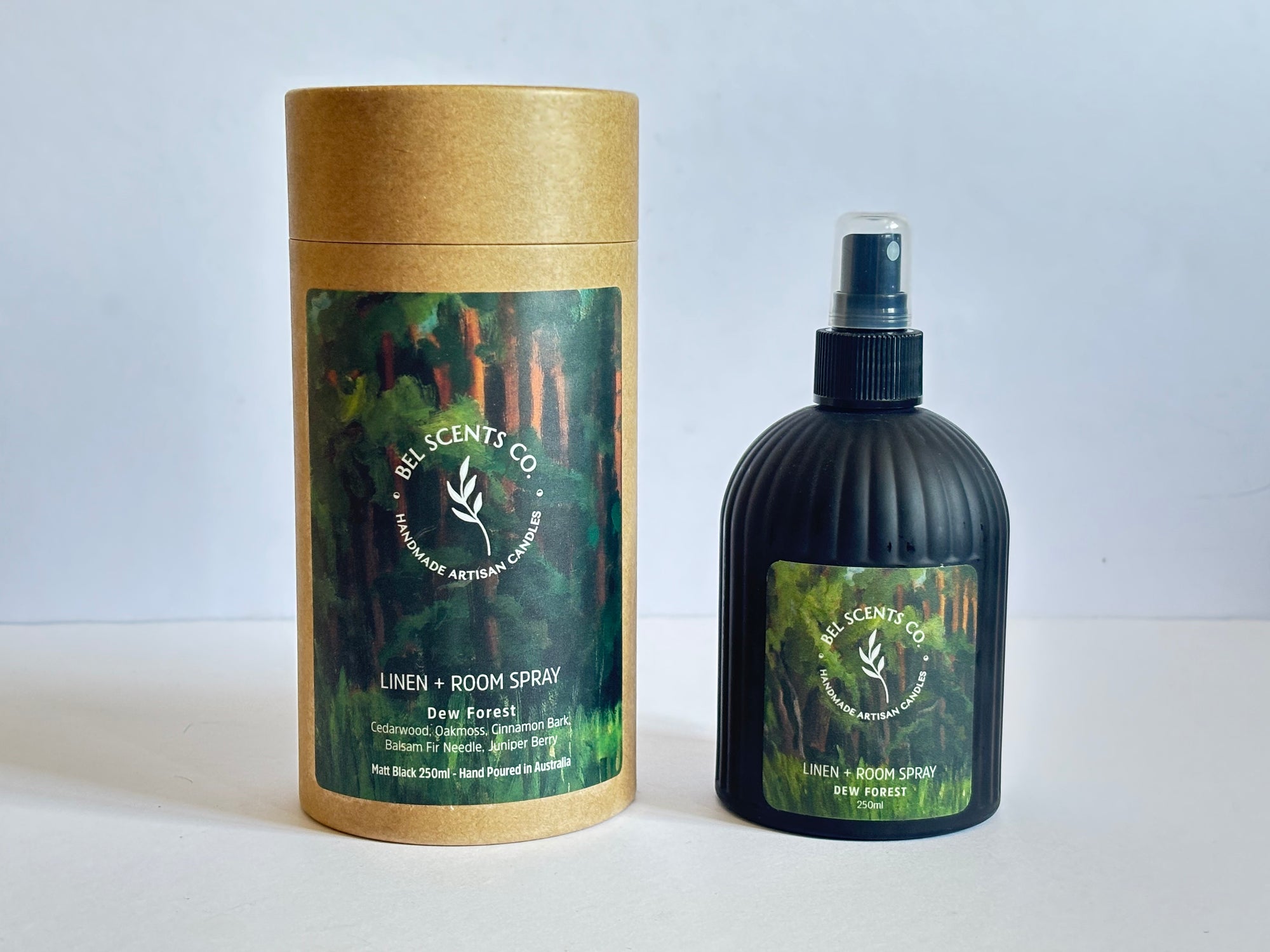 Natural linen and room spray in 250ml bottle, Dew Forest scent with fir needle, cedar wood, and oak moss, hand-poured in Melbourne. Minimalist room spray for home fragrance in recyclable glass packaging.made with botanical ingredients. Our Fabric spray is a great pillow mist with aromatherapy purpose fit sprays. Great Air fresheners for your home fragrance. Made with pure essential oils making it a perfect essential oil spray gift. Make our Dew Forest Scented Spray apart of your home decor. 