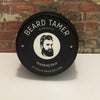 All-Natural Beard Balm for Men in Tin Container – Conditioning and Styling Balm with Essential Oils for Soft, Healthy Beard Care. Scented in Peru of Balsam Oil displayed on industrial brick wall setting 