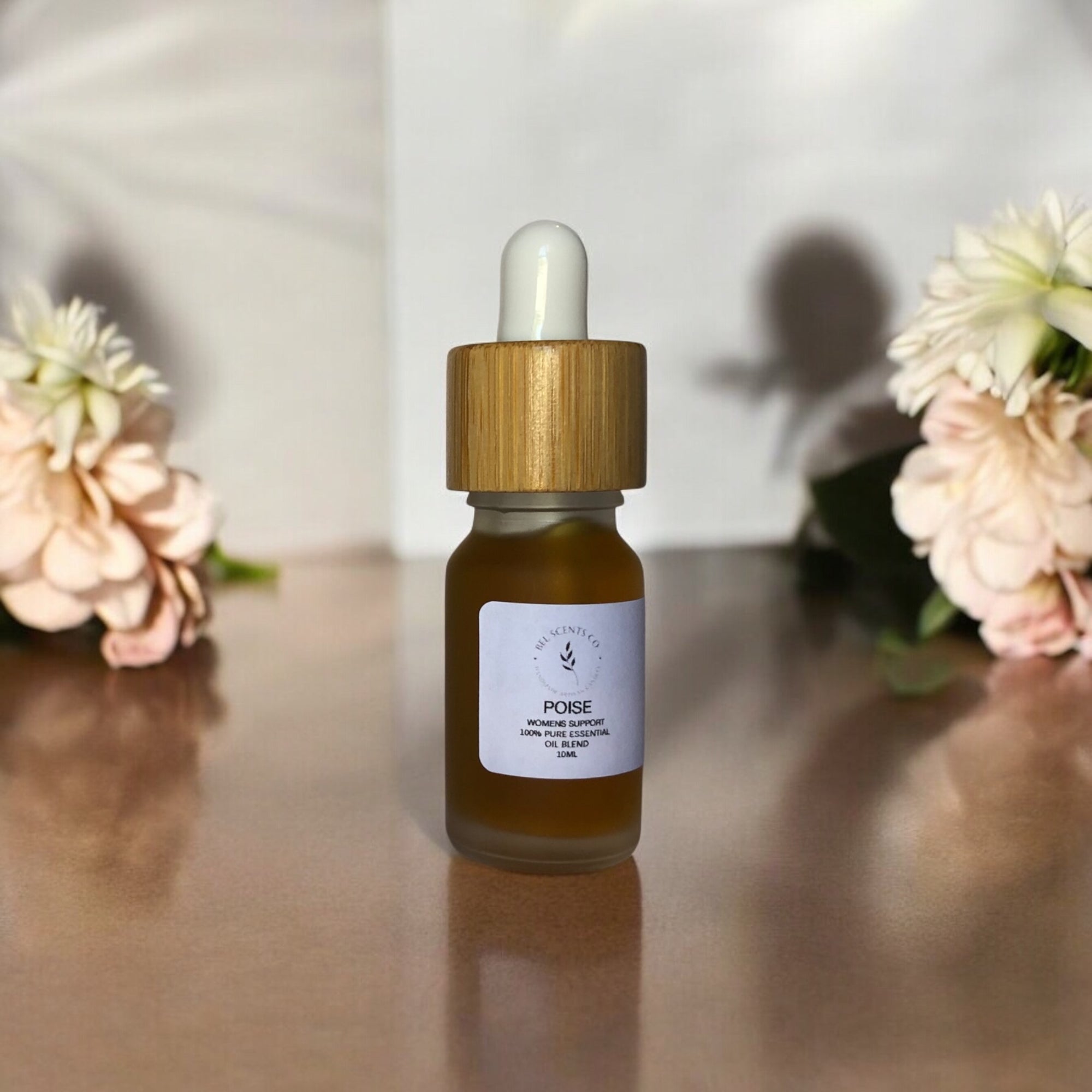 A collection of pure essential oil blends in  frosted glass bottles, labeled for wellness, sleep, and therapeutic purposes, arranged in ocean view setting. Made for therapeutic purposes. For your oil burner and diffuser. 100% Naturally made from pure essential oils made in Australia. Made for relaxation and aromatherapy. for self care vegan and eco friendly choice. For hormone and mood support. 