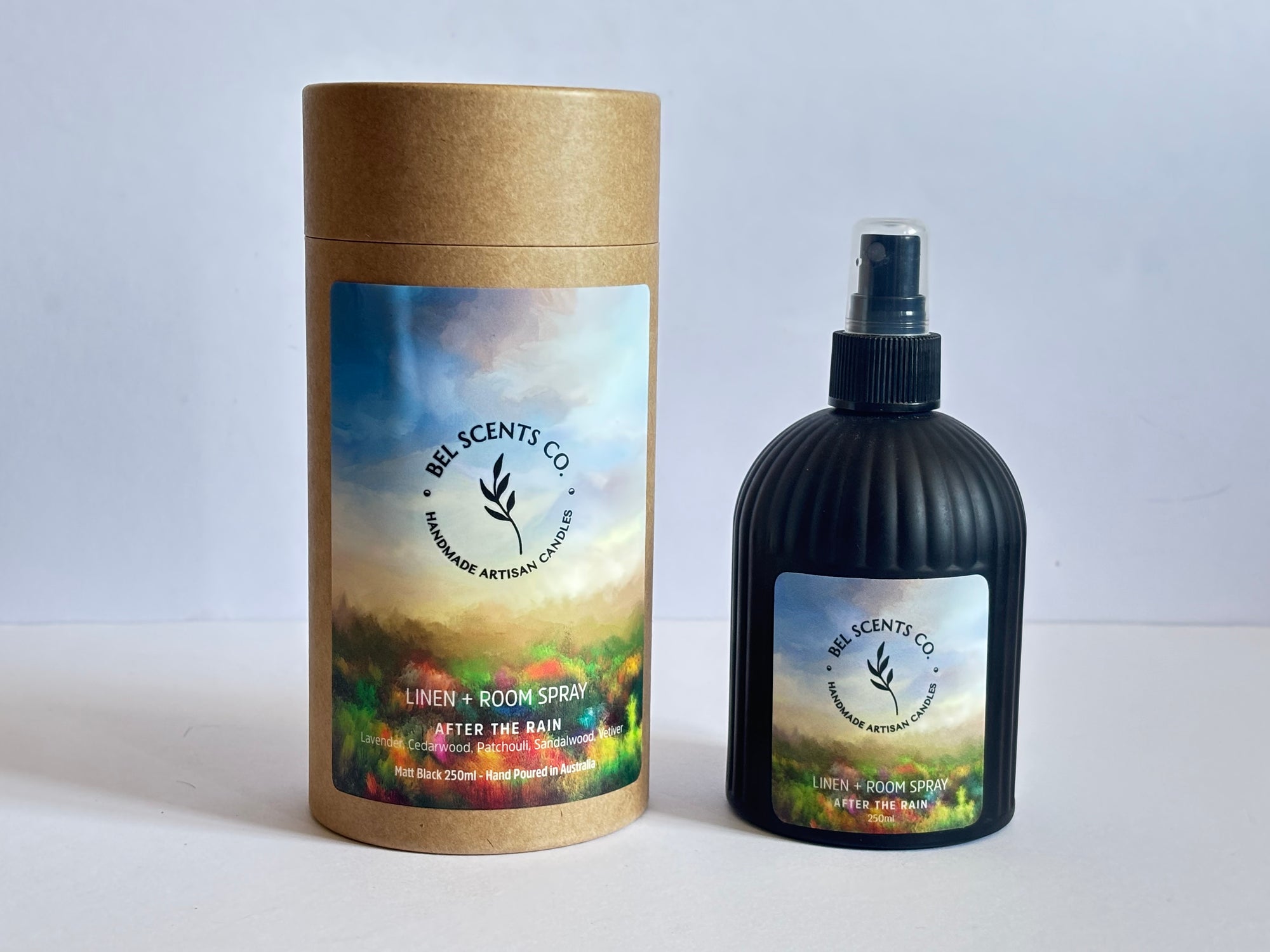 Natural linen and room spray in 250ml bottle, After the Rain Petrichor Essence of  Essential Oil blend. hand-poured in Melbourne. Minimalist room spray for home fragrance in recyclable glass packaging.made with botanical ingredients. Our Fabric spray is a great pillow mist with aromatherapy purpose fit sprays. Great Air fresheners for your home fragrance. Made with pure essential oils making it a perfect essential oil spray gift. Make our After the Rain Scented Spray apart of your home decor.